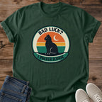Witchy Cat Tee Retro Moon Silhouette Design Black Cat Graphic Shirt Vintage Celestial Fashion Statement Cat Lover Gift Perfect Present Crescent Moon Circle Halloween Style Essential Casual Wear Tee Sunset Colors Alternative Fashion Vintage