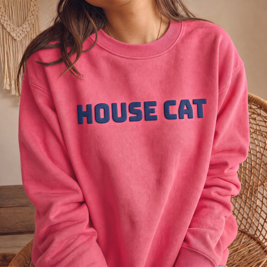 Pink HOUSE CAT puff print sweatshirt with navy raised lettering, playful cozy cat crewneck for cat moms, cat lovers and indoor cat enthusiasts.
