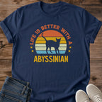 Vintage Cat Tee Retro Sunset Design Abyssinian Cat Lover Gift Lightweight Cotton Shirt Comfortable Casual Wear Breathable Fabric Soft Material Crew Neck Tee Cat Owner Apparel Pet Parent Fashion Warm Color Palette Nostalgic Style Statement
