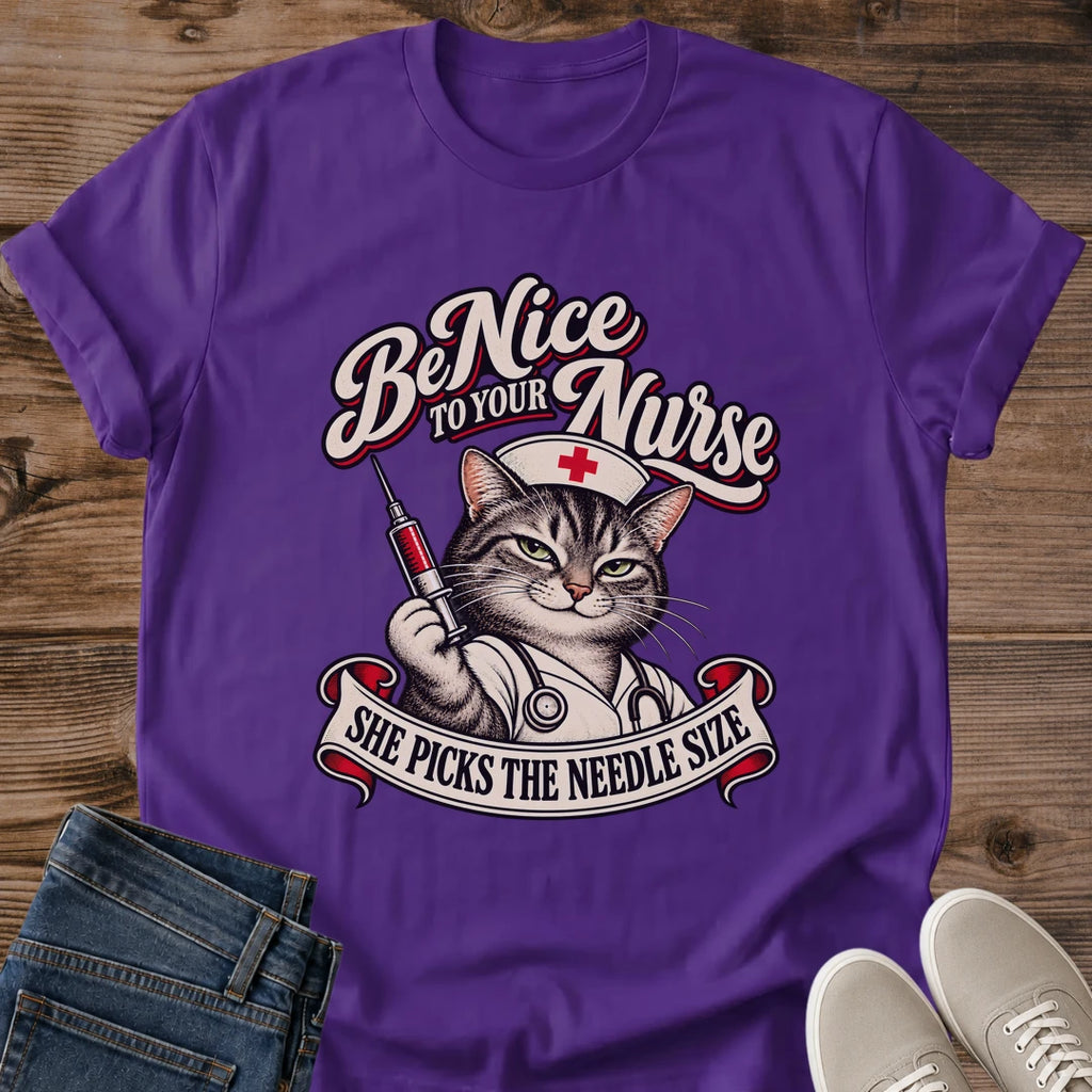 Be Nice To Your Nurse Cat Shirt Purple Funny Nurse Cat Tee Tabby Cat In Nurse Cap Holding Syringe Graphic She Picks The Needle Size Shirt Nurse Gift RN Cat Lover Tee Nurses Week Tee Gildan 64000 Softstyle Unisex Cat Whisker Co