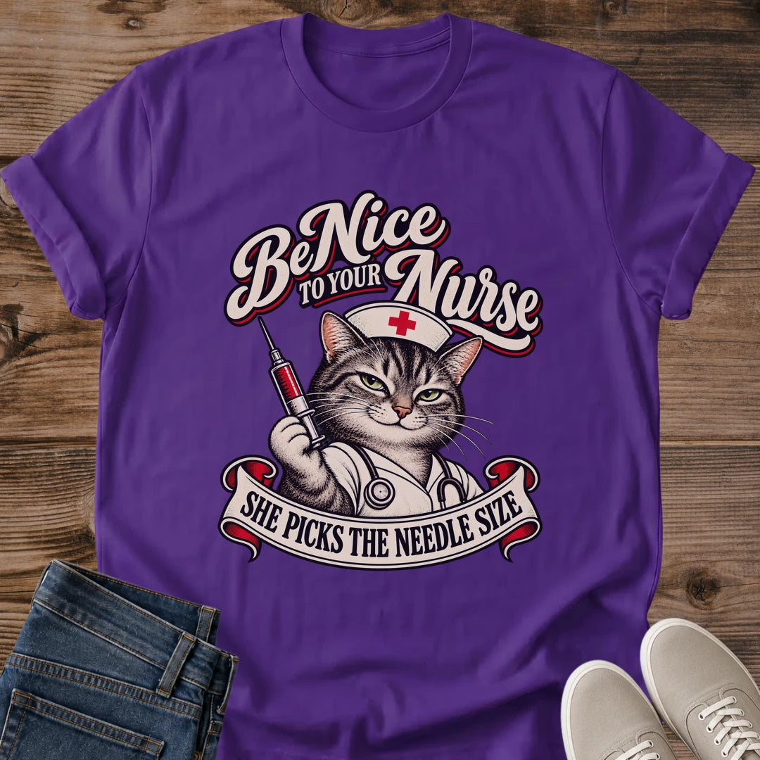 Be Nice To Your Nurse Cat Shirt Purple Funny Nurse Cat Tee Tabby Cat In Nurse Cap Holding Syringe Graphic She Picks The Needle Size Shirt Nurse Gift RN Cat Lover Tee Nurses Week Tee Gildan 64000 Softstyle Unisex Cat Whisker Co