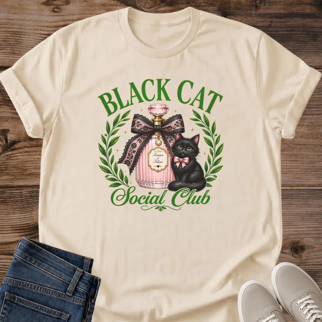 Graphic Tee Women Black Cat Design Coquette Aesthetic Shirt With Perfume Bottle Art Green Eyes Cat Detail Feminine Fashion Statement Pink Bow Accent Laurel Wreath Frame Cat Lover Gift Idea Casual Wear Essential Soft Girl Style Unique Design