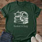 Reading Enthusiast Tee Soft Cotton Crew Neck Shirt Design Featuring Cozy Cat Illustration Atop Book Stack Hand Drawn Vintage Style Artwork Comfortable Lightweight Ring Spun Cotton Construction Perfect Gift For Book Lovers Casual Bookish
