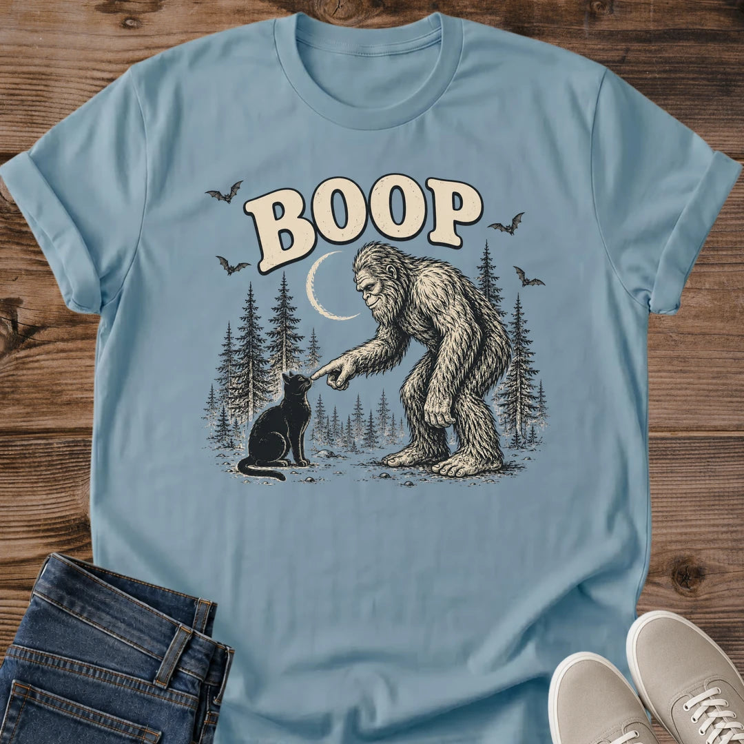 Sasquatch Cat Tee Boop Graphic Shirt Black Cat And Bigfoot Storybook Illustration Pine Trees Crescent Moon Design Cat Owner Gift Comfortable Softstyle Cotton Casual Outdoor Wear Bigfoot Black Cat Shirt