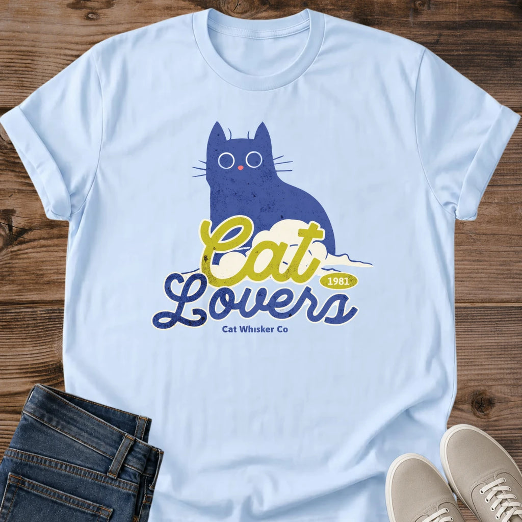 Blue Cat Graphic Tee Illustrated Cat Lover Shirt Whimsical Design Retro Script Typography Soft Lightweight Fabric Comfortable Casual Wear Wide Eye Cat Art Bold Print Quality Everyday Statement Piece Perfect Pet Parent Gift Weekend Lounging
