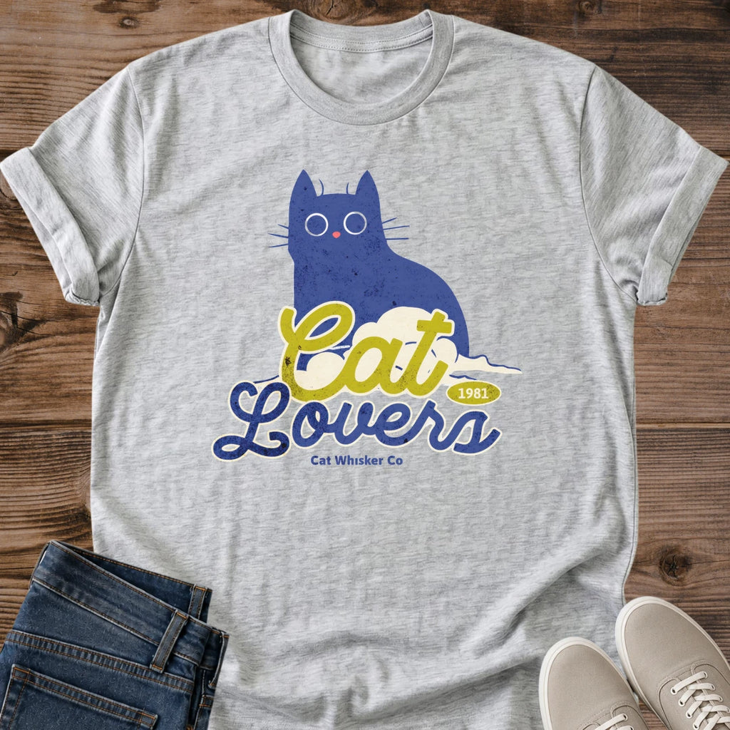 Cat Lover Shirt Blue Cat Graphic Tee Illustrated Design Soft Fabric Comfortable Fit Whimsical Art Retro Typography Wide Eye Cat Perfect Gift Idea Casual Weekend Wear Lightweight Material Everyday Essential Pet Parent Statement Piece Coffee