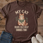 Cozy Reading Shirt Cat Book Lover Tee Cotton Graphic Design Vintage Tabby Illustration Holding Book MY CAT Headline Retro Aesthetic Cream Lettering Leafy Accents Perfect Gift Bookworm Present Cat Owner Literary Enthusiast Casual Comfortable