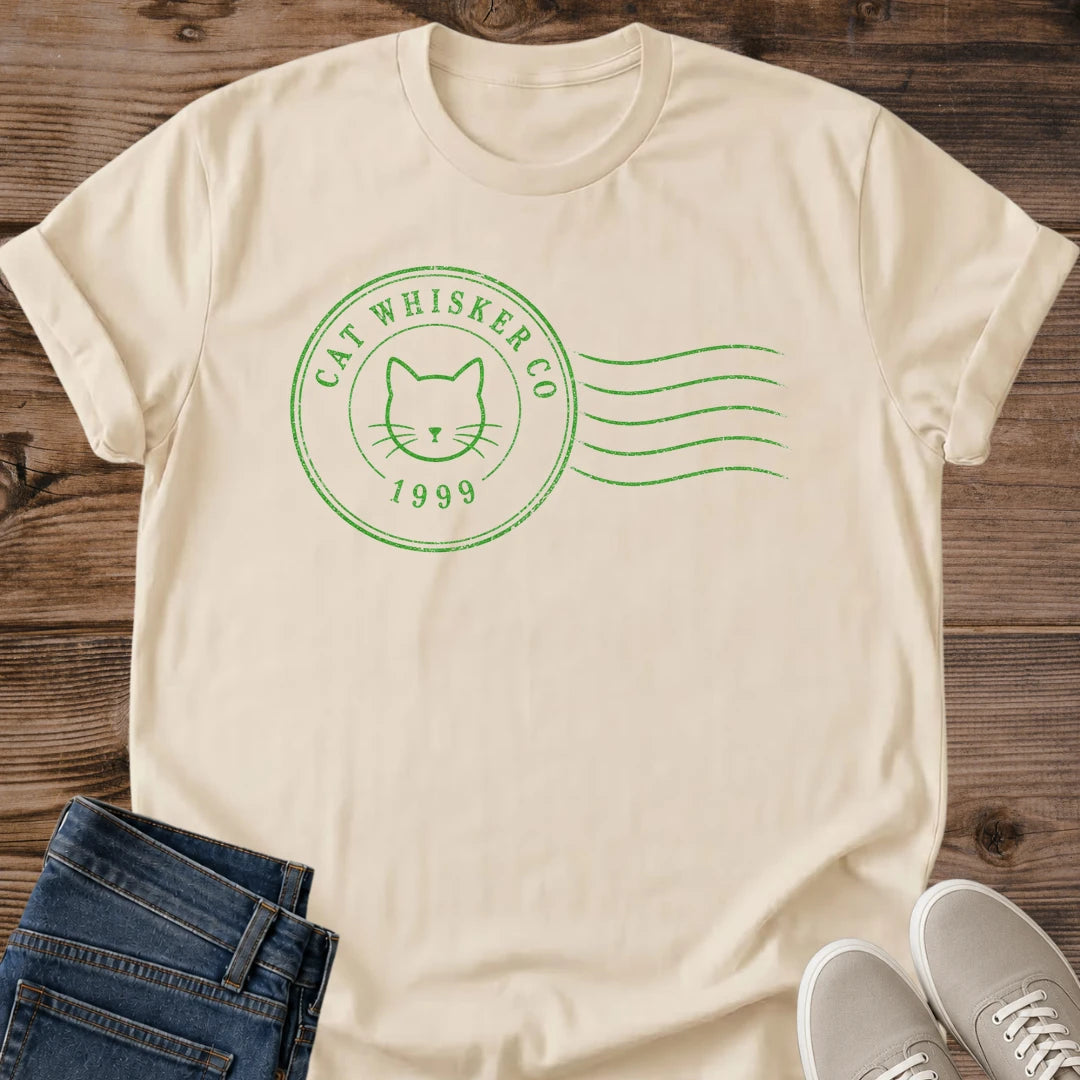 Aesthetic Cat Shirt Minimalist Design Vintage Sage Green Tee Subtle Cat Face Graphic Postmark Style Cat Shirt Vintage Inspired Feline Tee Soft Green Minimalist Design Cat Lover Fashion Statement Contemporary Cat Graphic Shirt Understated