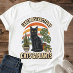 Gift For Cat Plant Lover Vintage Graphic Shirt Retro Design Tee Soft Cotton Fabric Black Cat Houseplant Illustration Sunset Stripe Background Crew Neck Style Casual Everyday Wear Cozy Comfortable Fit Perfect Plant Parent Gift Cat Owner