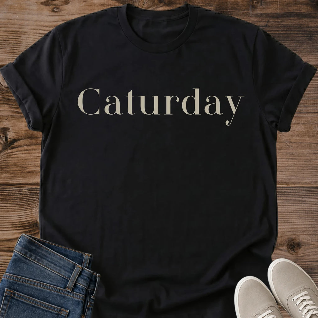 Graphic Cat Tee Elegant Caturday Script Design Weekend Casual Shirt Comfortable Lightweight Fabric Cat Lover Gift Perfect Feline Fashion Statement Cozy Weekend Style Essential Cat Themed Apparel Animal Enthusiast Present Lounging Outfit