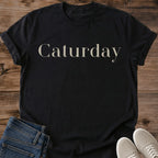 Graphic Cat Tee Elegant Caturday Script Design Weekend Casual Shirt Comfortable Lightweight Fabric Cat Lover Gift Perfect Feline Fashion Statement Cozy Weekend Style Essential Cat Themed Apparel Animal Enthusiast Present Lounging Outfit