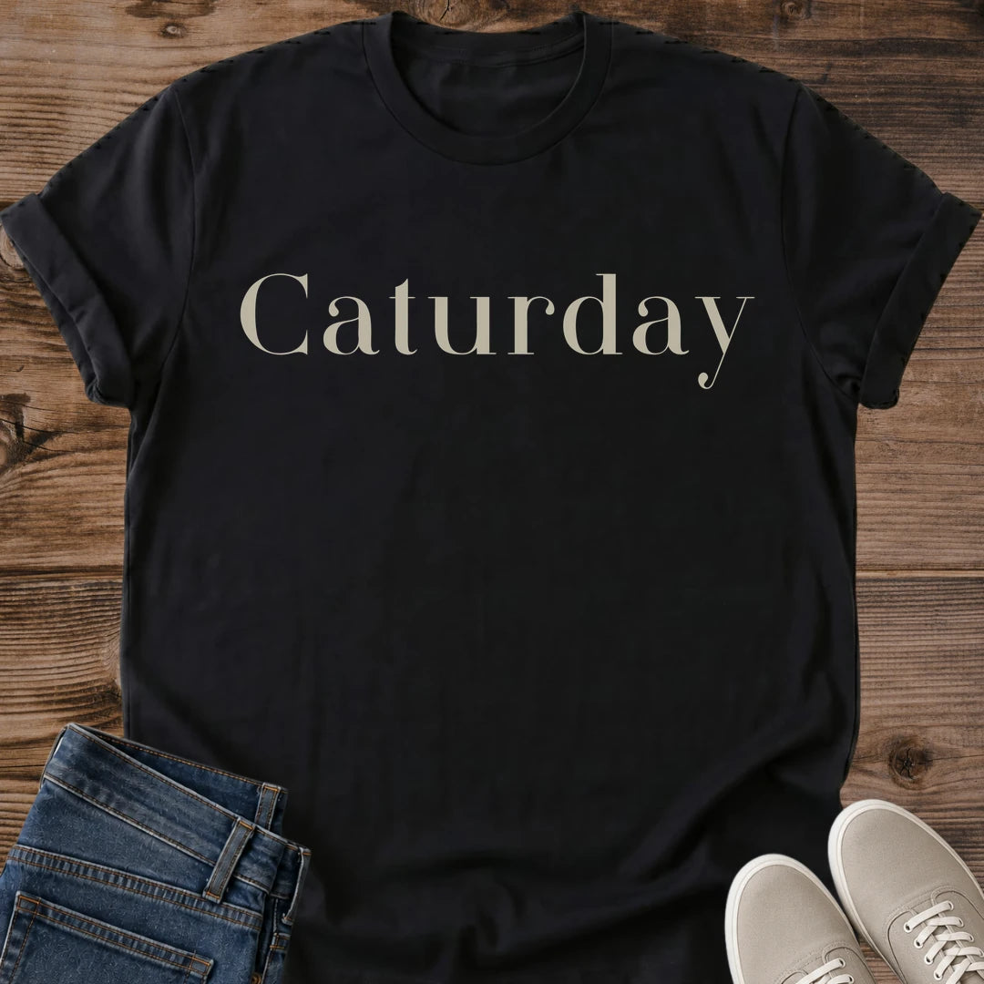 Graphic Cat Tee Elegant Caturday Script Design Weekend Casual Shirt Comfortable Lightweight Fabric Cat Lover Gift Perfect Feline Fashion Statement Cozy Weekend Style Essential Cat Themed Apparel Animal Enthusiast Present Lounging Outfit