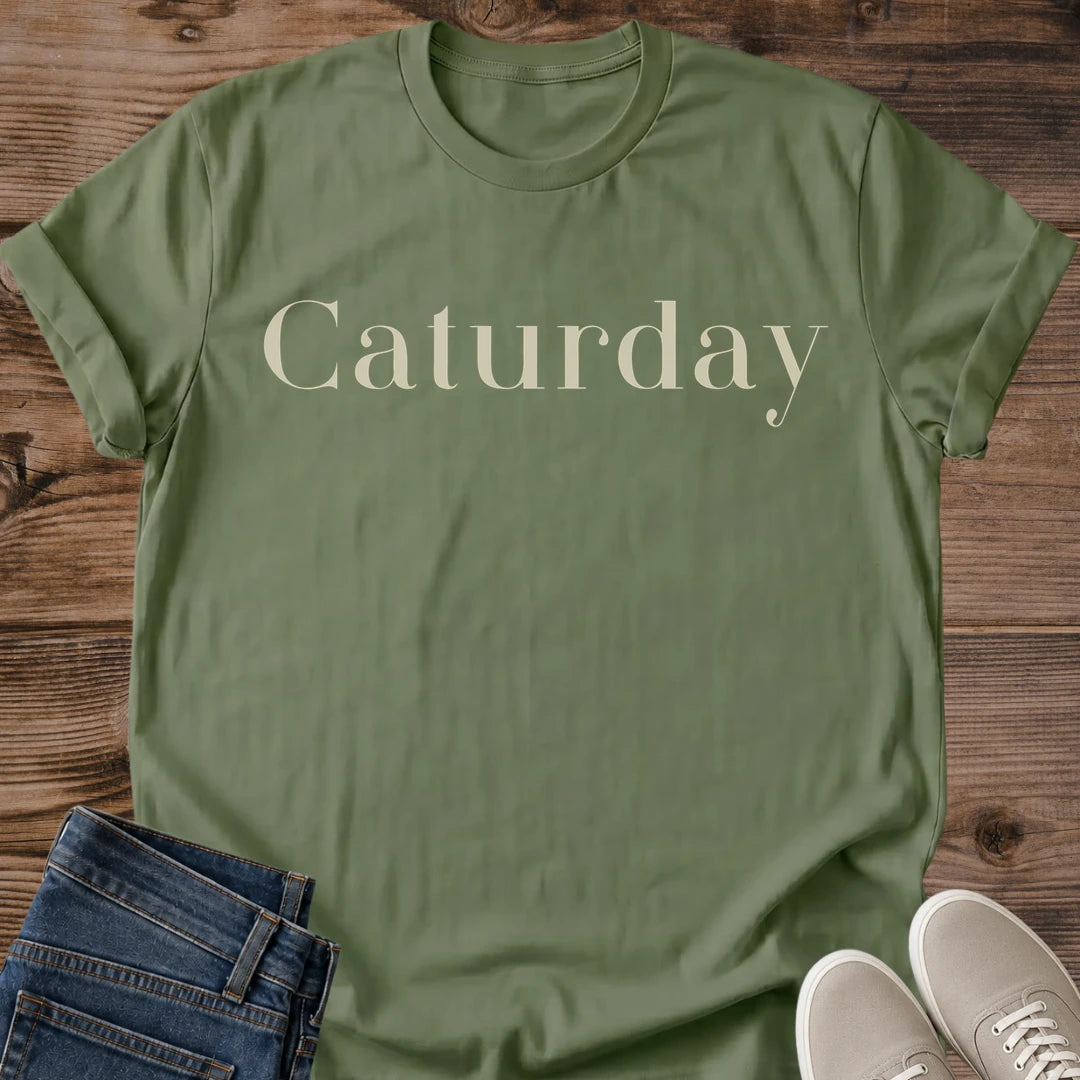 Weekend Casual Wear Cat Lover Shirt Caturday Design Cozy Comfortable Tee Elegant Serif Typography Lightweight Fabric Perfect Feline Fashion Gift Cat Themed Clothing Animal Lover Apparel Birthday Present Lounging Style Coffee Run Essential