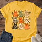 Hand Drawn Cat Collection Grid Pattern Design Soft Cotton Graphic Tee Comfortable Relaxed Fit Autumn Warm Tones Earthy Colors Playful Cat Personalities Casual Everyday Shirt Crew Neck Style Perfect Cat Lover Present Cozy Apparel Gift