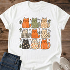 Cozy Cotton Cat Shirt Soft Breathable Fabric Playful Grid Pattern Design Multiple Cat Personalities Autumn Colors Warm Earthy Tones Comfortable Relaxed Fit Everyday Casual Wear Crew Neck Tee Perfect Cat Lover Gift Present Quality Printed