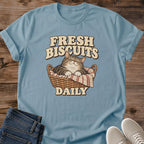 Fresh Biscuits Daily Cat Shirt Stone BlueFunny Bakery Cat Tee Tabby Cat Sleeping In Bread Basket Graphic Retro Baker Cat Shirt Cottagecore Kitchen Tee Baker Gift Cat Mom Shirt Gildan 64000 Softstyle Unisex Cat Whisker Co