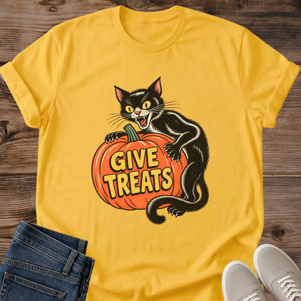 Daisy yellow Halloween T-shirt flat lay featuring a vintage-style black cat hugging an orange pumpkin with yellow Give Treats lettering.