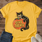 Daisy yellow Halloween T-shirt flat lay featuring a vintage-style black cat hugging an orange pumpkin with yellow Give Treats lettering.