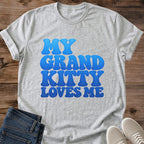 Funny Cat Graphic Tee My Grand Kitty Loves Me Bubble Text Print Retro Aesthetic Cat Owner Shirt Gift For Cat Lovers Softstyle Cotton Comfortable Relaxed Fit Statement Piece Everyday Casual Wear Apparel Gift Idea