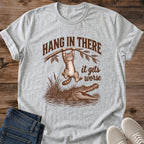 Sport grey Hang In There Gator cat T-shirt with vintage tabby above an alligator and “It gets worse” sarcastic graphic
