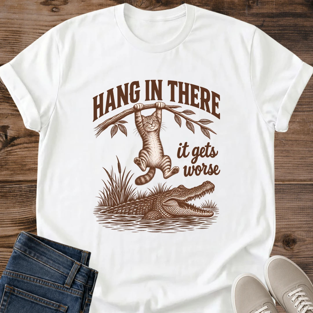 White Hang In There Gator cat T-shirt with vintage tabby above an alligator and “It gets worse” sarcastic graphic