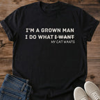 Cat Guy Shirt Grown Man Cat Tee I Do What My Cat Wants Bold Block Lettering With Crossed Out Words Design Funny Cat Dad Shirt Cat Owner Gift For Him Boyfriend Gift Tee Cat Runs My Life Tee Soft Cotton Unisex Shirt Cat Whisker Co
