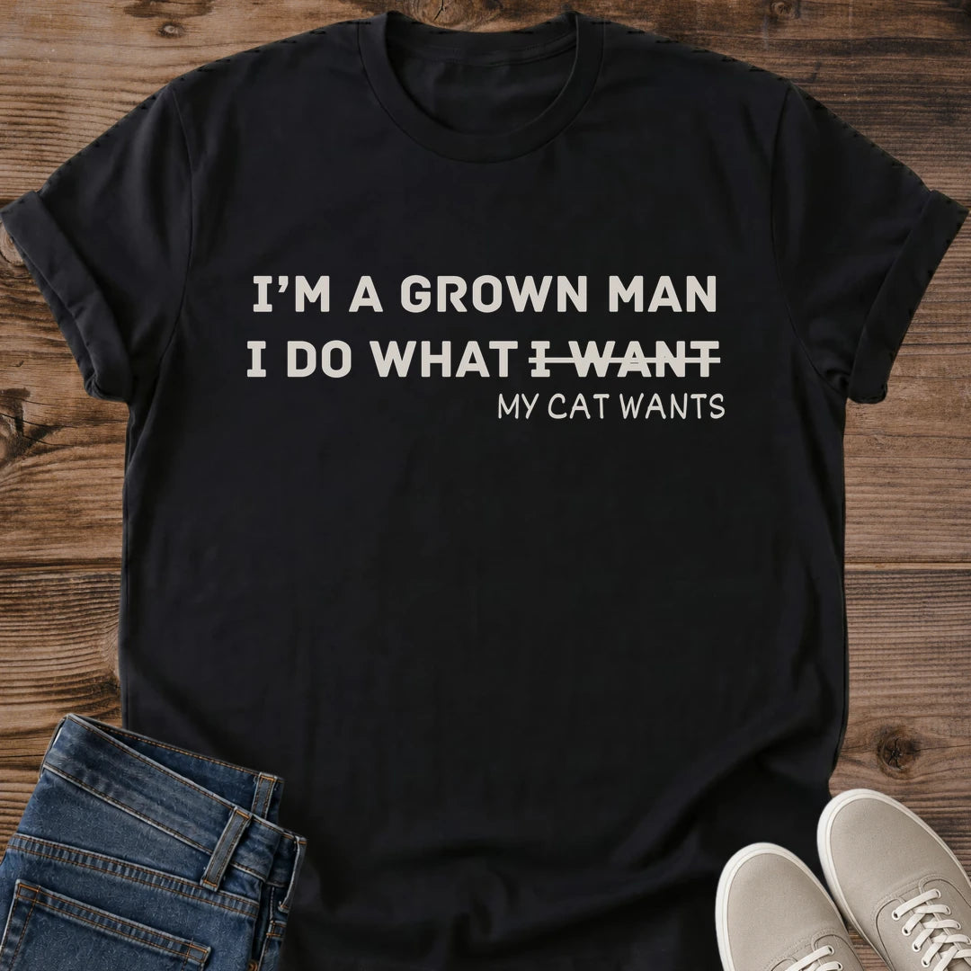 Cat Guy Shirt Grown Man Cat Tee I Do What My Cat Wants Bold Block Lettering With Crossed Out Words Design Funny Cat Dad Shirt Cat Owner Gift For Him Boyfriend Gift Tee Cat Runs My Life Tee Soft Cotton Unisex Shirt Cat Whisker Co