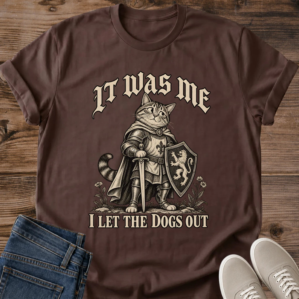 It Was Me I Let The Dogs Out Cat Shirt Dark Choclate Funny Knight Cat Tee Medieval Tabby Cat In Armor With Shield Graphic Gothic Lettering Cat Shirt Mischievous Cat Meme Tee Cat Lover Gift Gildan 64000 Softstyle Unisex Cat Whisker Co