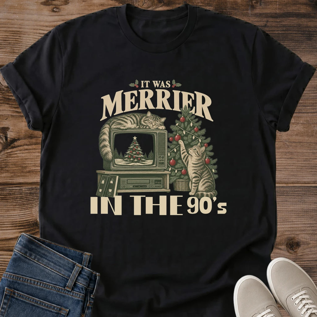 Black It Was Merrier in the 90s cat Christmas graphic tee with cats beside a retro TV in a nostalgic holiday scene