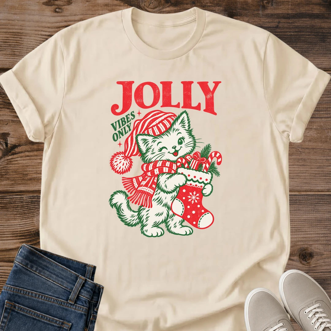 Sand Jolly Vibes Only Christmas cat shirt featuring a festive cat in a striped winter hat and nostalgic holiday illustration