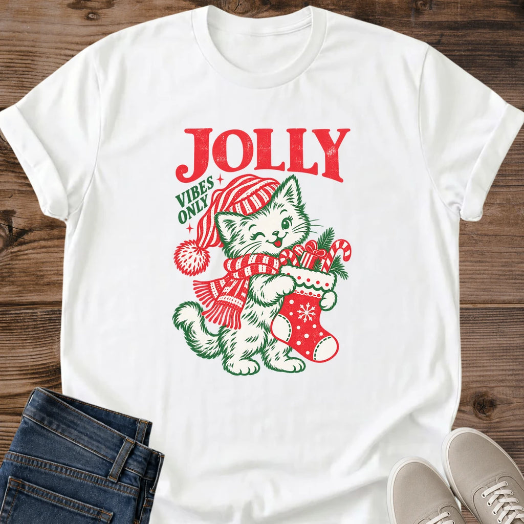 White Jolly Vibes Only Christmas cat graphic tee featuring a festive cat in a striped winter hat and retro holiday artwork