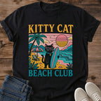 Beach Vacation Shirt Summer Cat Design Retro Surf Club Tee Unisex White Cotton Graphic Shirt Black Cat Pink Sunglasses Illustration Teal Surfboard Style Vintage Sunset Graphics Cat Lover Casual Wear Funny Beach Theme Apparel Soft