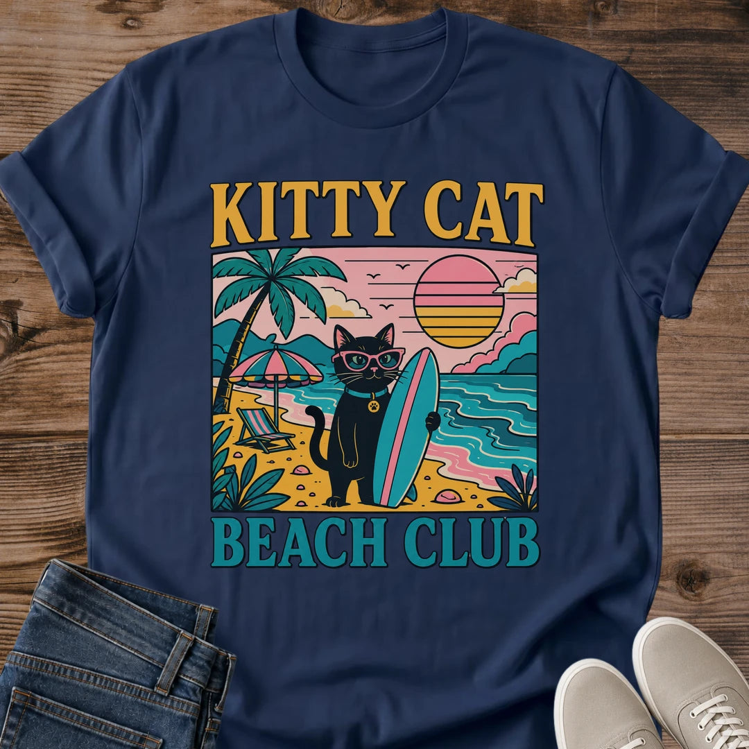 Cat Lover Gift Shirt Funny Beach Design Retro Surf Club Graphic Tee Black Cat Wearing Pink Sunglasses Teal Surfboard Illustration Vintage Sunset Colors Unisex White Cotton Shirt Summer Casual Wear Beach Vacation Outfit Novelty Cat Themed