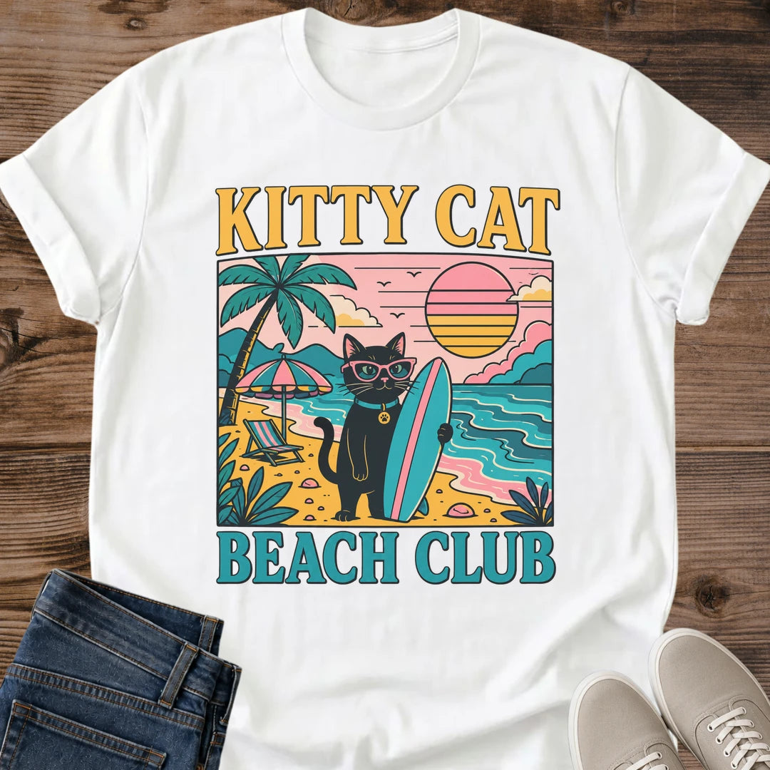 Retro Beach Shirt Vintage Surf Club Design Cat Graphic Tee Unisex White Cotton Shirt Black Cat Illustration Pink Sunglasses Style Teal Surfboard Graphics Bold Sunset Colors Summer Casual Wear Funny Cat Lover Gift Beach Themed Apparel Soft