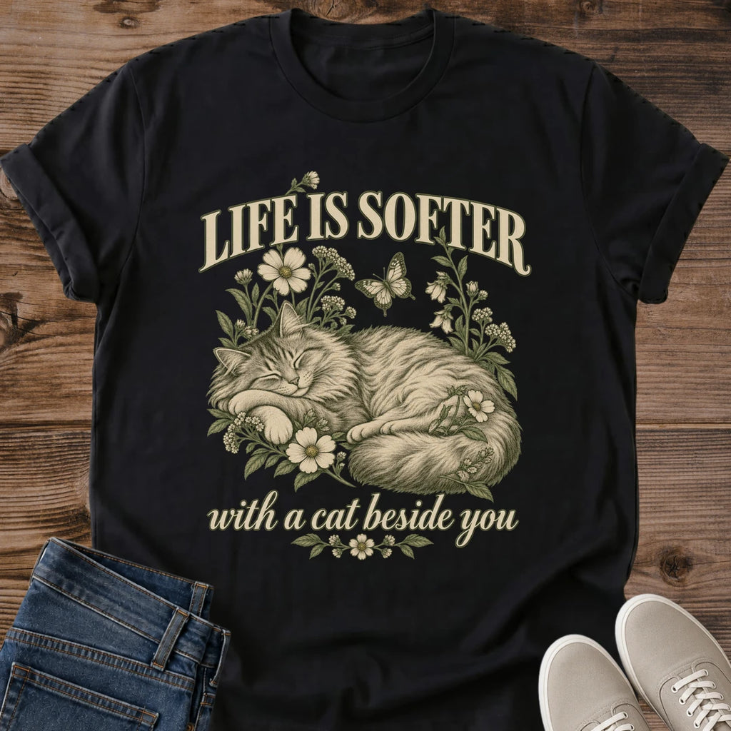 Life Is Softer With A Cat Beside You Shirt Black Cozy Cat Quote Tee Fluffy Cat Sleeping In Wildflowers Graphic Vintage Floral Cat Shirt Sentimental Cat Mom Gift Life Is Better With Cats Tee Gildan 64000 Softstyle Unisex Cat Whisker Co