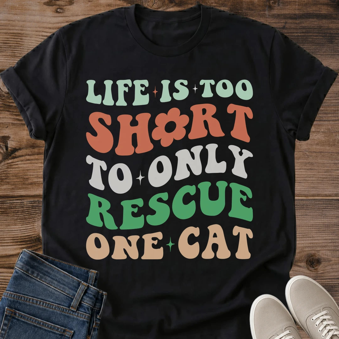 Retro Groovy Cat Shirt Vintage Typography Design Wavy Text Pattern Funny Cat Rescue Tee Multi Cat Owner Apparel Sage Green Coral White Colors Cat Lover Fashion Statement Casual Wear Gift Animal Shelter Volunteer Shirt Cat Mom Dad Style