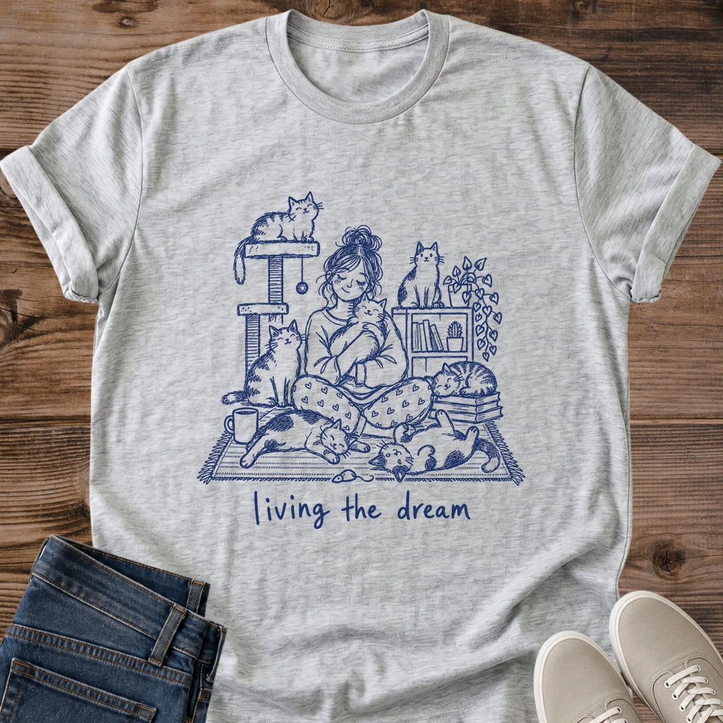 Living The Dream Cat Shirt White Cozy Cat Mom Tee Woman Surrounded By Many Cats Line Art Graphic Multi Cat Household Shirt Homebody Cat Lover Gift Pajama Day Tee Cat Tree And Plants Gildan 64000 Softstyle Unisex Cat Whisker Co