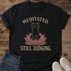 Soft Cotton Graphic Tee Funny Meditation Design Casual Everyday Shirt Sarcastic Zen Cat Print Comfortable Relaxed Fit Yoga Lover Gift Lightweight Fabric Muted Earthy Tones Lotus Flower Design Perfect Loungewear Statement Shirt Cat