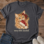Dark heather Merry Little Mischief Christmas cat T-shirt flat lay featuring an orange tabby with a red plaid bow holding a Santa hat.