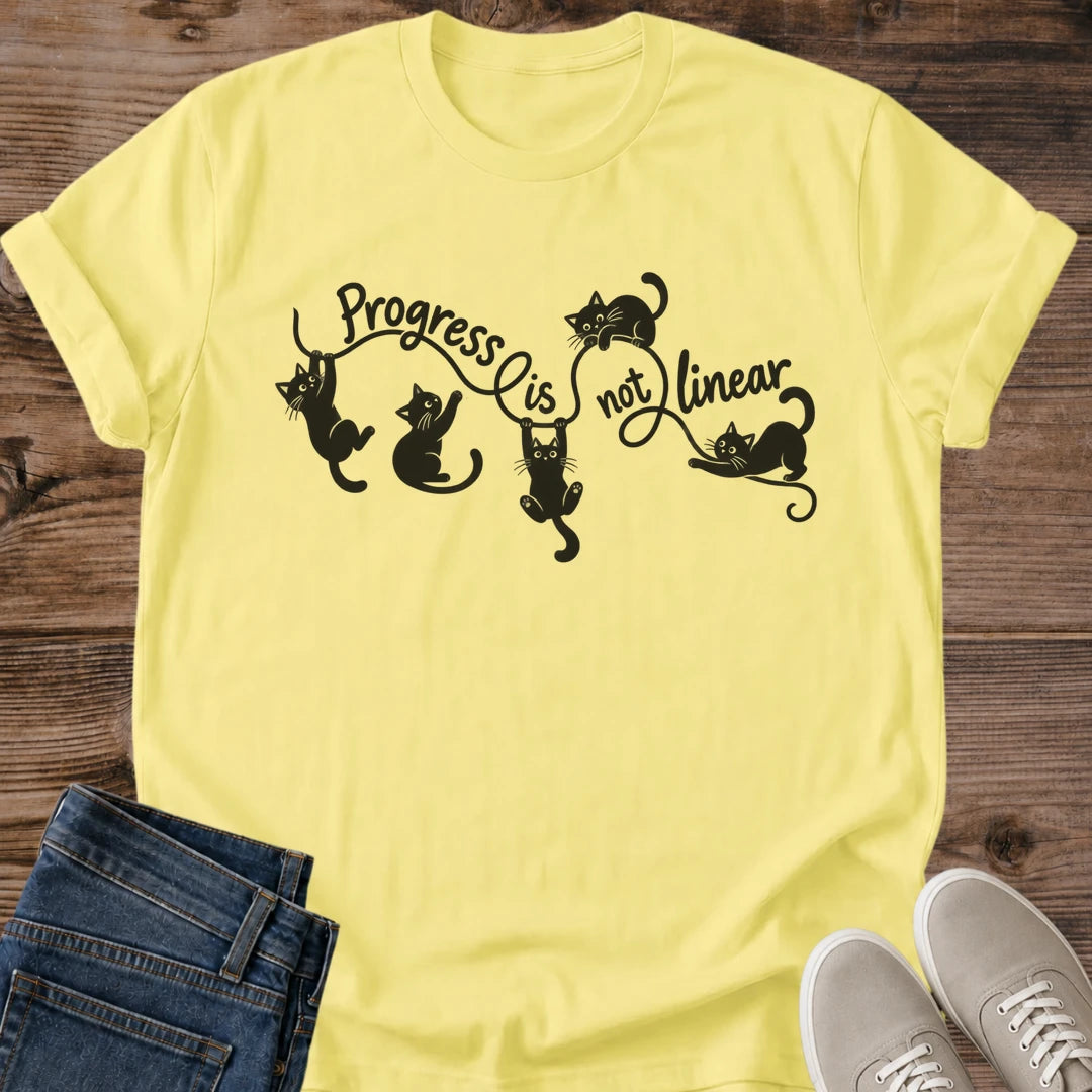 Positive Quote Shirt Progress Is Not Linear Cat Mom Tee Inspirational Cat Gift Minimal Black Cat Design Quote Shirt For Women And Men Cat Dad Gift Holiday Gift For Cat Owner One Step At A Time Tee Soft Cotton Unisex Tee Cat Whisker Co