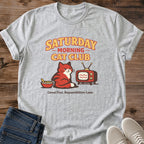 Vintage Graphic Tee Retro Cat Design Nostalgic Fashion Statement Saturday Morning Theme Cozy Weekend Wear Comfortable Casual Shirt Soft Cotton Blend Lightweight Fabric Cat Lover Apparel Unisex Fit Relaxed Style Bold Typography Design