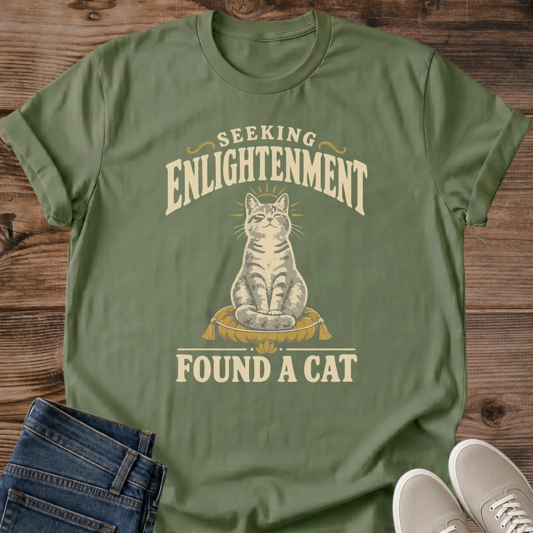 Vintage Graphic Cat Shirt Quirky Statement Tee Spiritual Humor Design Funny Cat Lover Gift Soft Cotton Fabric Comfortable Everyday Wear Seeking Enlightenment Message Muted Tones Dark Background Centered Illustration Casual Wardrobe