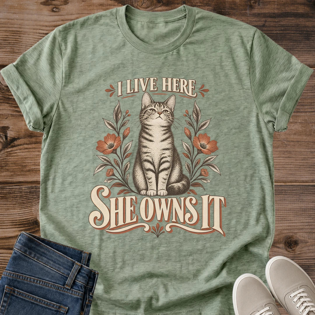 She Owns It Cat Tee I Live Here Floral Design Funny Cat Lover Gift For Her Softstyle Cotton Comfortable Relaxed Fit Casual Weekend Wear Vintage Print Cat Mom Statement Apparel Everyday Layering Piece For Fun