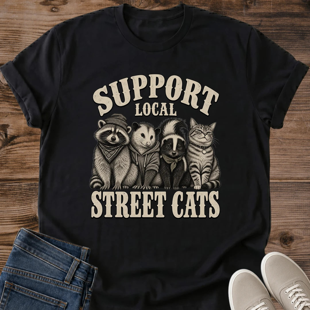 Support Local Street Cats Shirt Black Funny Street Cat Meme Tee Tabby Cat With Raccoon Opossum And Skunk Graphic Vintage Cream Ink Shirt Neighborhood Night Crew Tee Cat Lover Gift Gildan 64000 Softstyle Unisex Cat Whisker Co