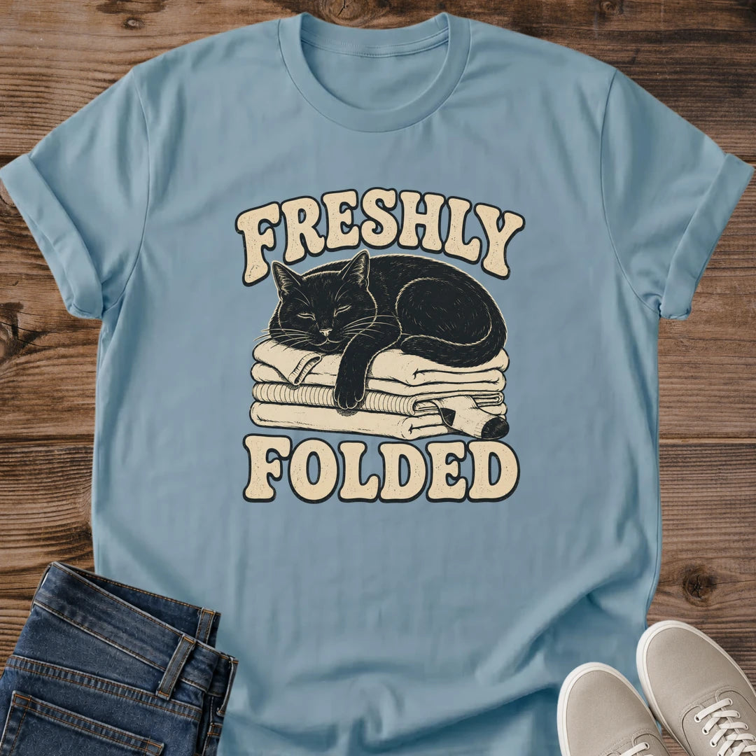 Laundry Cat Shirt Freshly Folded Funny Graphic Tee Black Cat Curled On Folded Laundry Vintage Design Cat Lover Gift Softstyle Ring Spun Cotton Relaxed Fit Casual Wear Cozy Cat Owner Tee