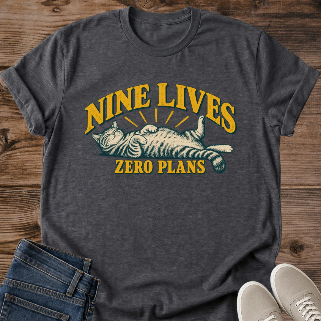 Nine Lives Zero Plans Cat Shirt Vintage Badge Graphic Tee Laid Back Cat Lover Gift Idea Softstyle Ring Spun Cotton Relaxed Fit Everyday Casual Wear Retro Print Cat Owner Apparel Statement Piece Lightweight Layering For Home