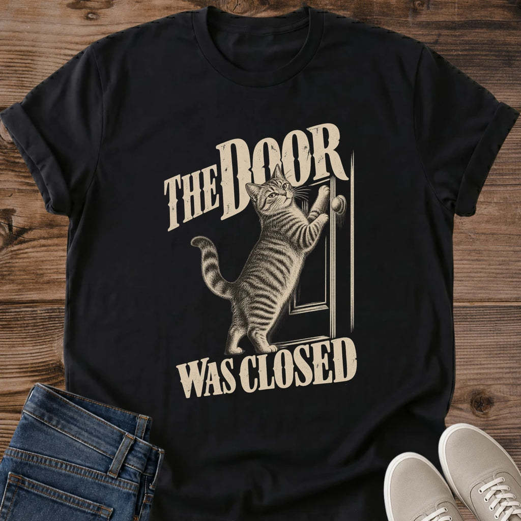The Door Was Closed Cat Shirt Black Funny Cat Behavior Tee Tabby Cat Scratching At Door Graphic Vintage Cream Ink Cat Shirt Cats Hate Closed Doors Tee Relatable Cat Owner Gift Cat Mom Shirt Gildan 64000 Softstyle Unisex Cat Whisker Co