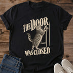 The Door Was Closed Cat Shirt Black Funny Cat Behavior Tee Tabby Cat Scratching At Door Graphic Vintage Cream Ink Cat Shirt Cats Hate Closed Doors Tee Relatable Cat Owner Gift Cat Mom Shirt Gildan 64000 Softstyle Unisex Cat Whisker Co