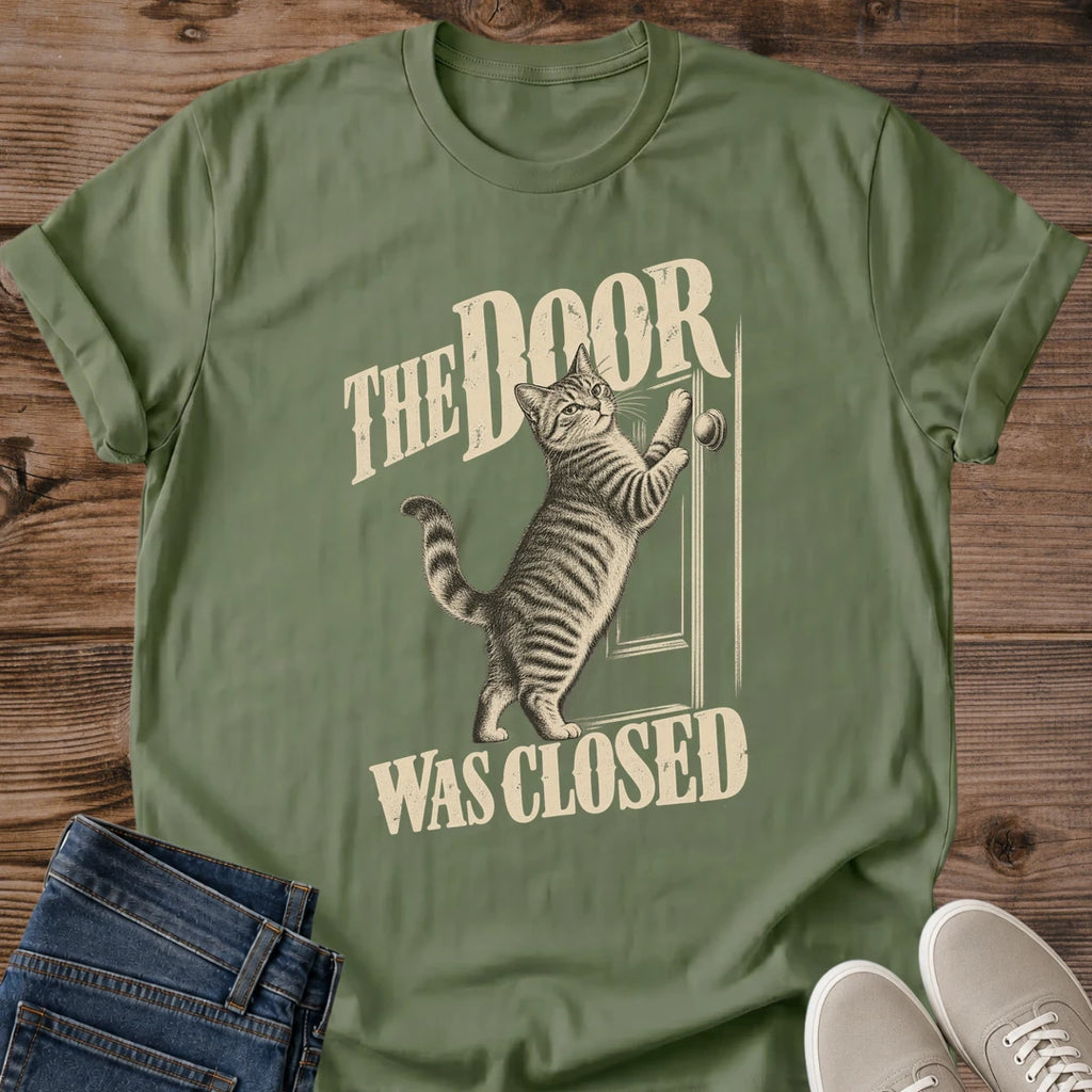Closed Door Cat Shirt The Door Was Closed Tee Desperate Tabby Pawing At Door Illustration Retro Condensed Lettering Funny Cat Dad Shirt Cat Owner Gift For Her Bathroom Door Cat Humor Tee Soft Cotton Unisex Shirt Cat Whisker Co