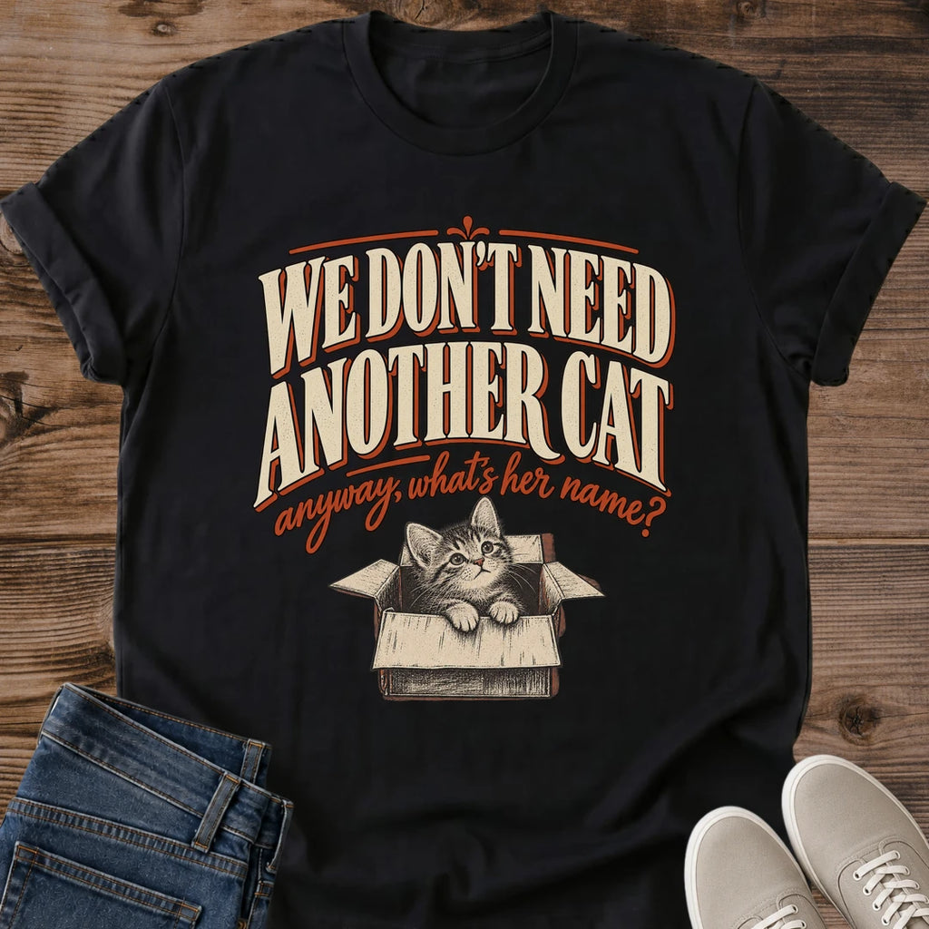 New Cat Shirt We Dont Need Another Cat Whats Her Name Graphic Tee Funny Gift Idea Ring Spun Cotton Soft Breathable Fabric Relaxed Unisex Fit Vintage Print Design Cat Person Apparel Casual Everyday Wear Statement Piece